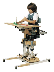 VS1 Vertical Stander with VS1T Tray, VS1C Casters, 
and VS1K Knee Support.